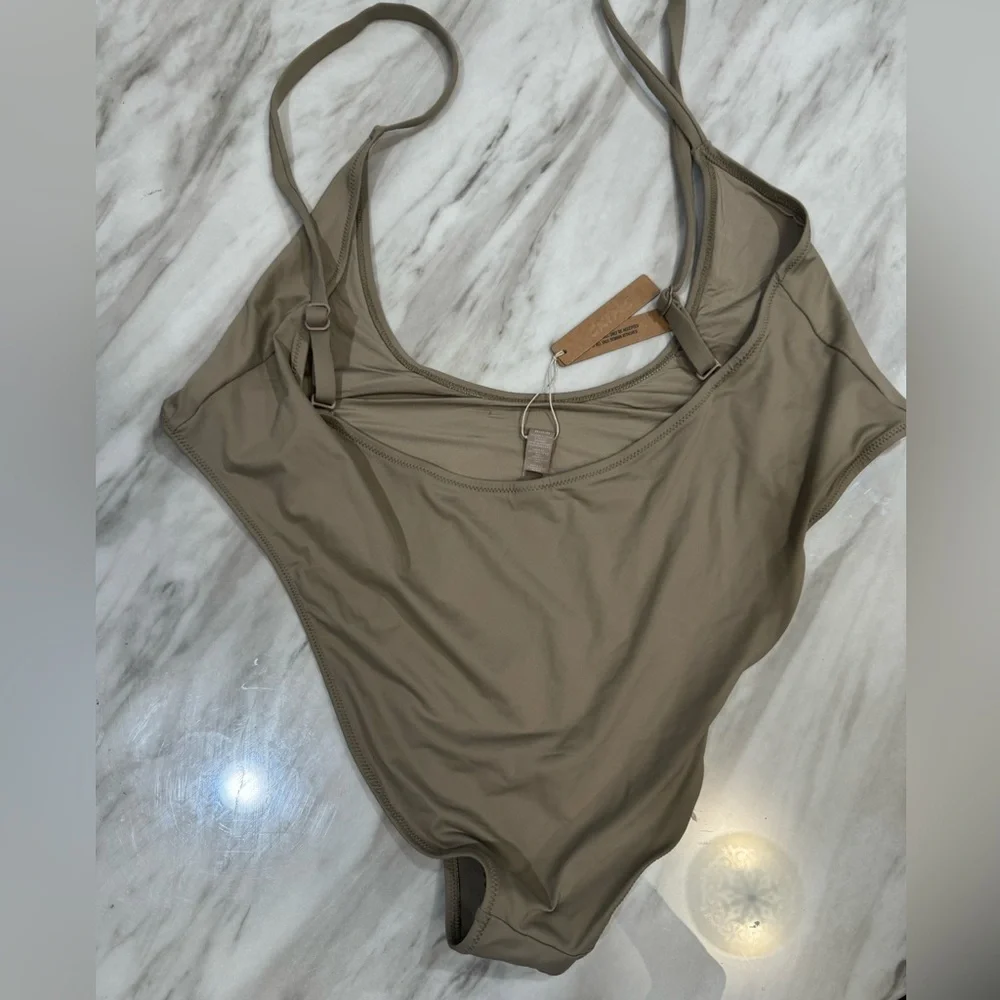Skims swim cut out open bust one piece size 4x